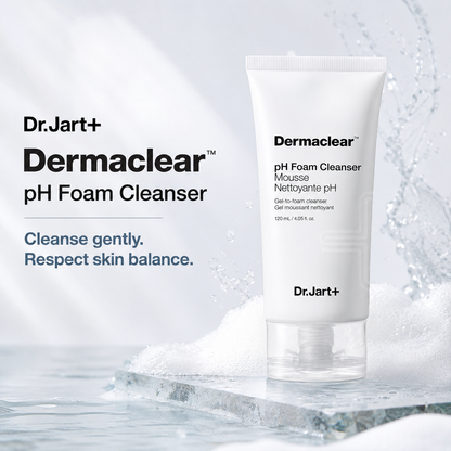 A white tube of Dr.Jart+ Dermaclear pH Foam Cleanser stands on a stone slab with water splashes around it.