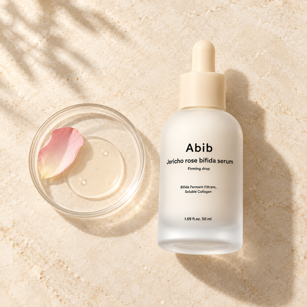 Abib Jericho Rose Bifida Firming Drop serum flat lay with serum texture