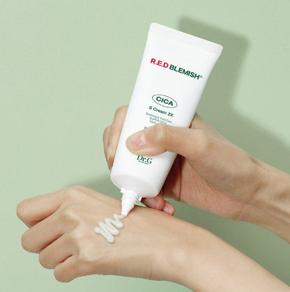 Dr.G Red Blemish Cica S Cream 2X 70ml tube dispensing a cream swatch
