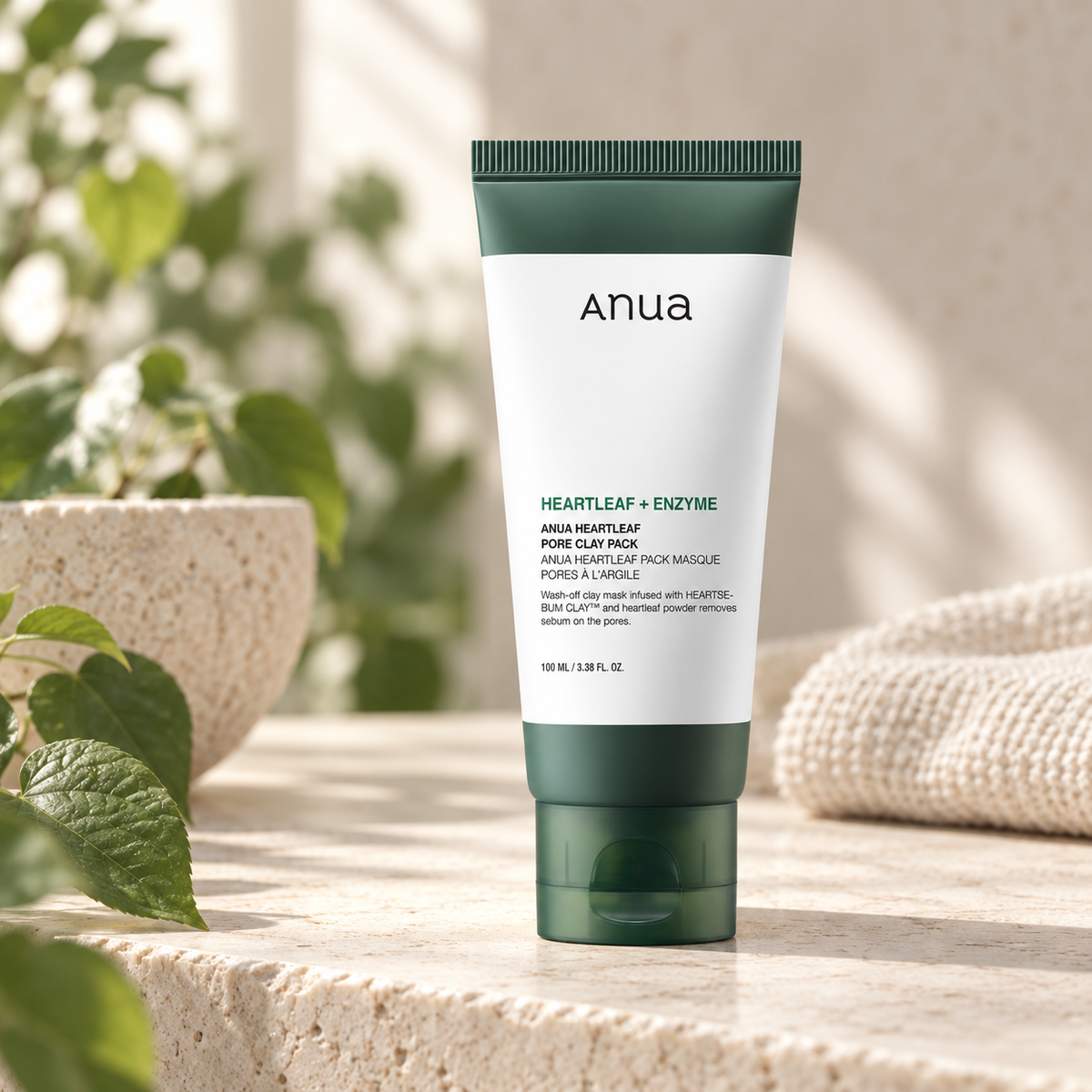 Anua Heartleaf Pore Clay Pack 100ml on a sage botanical vanity